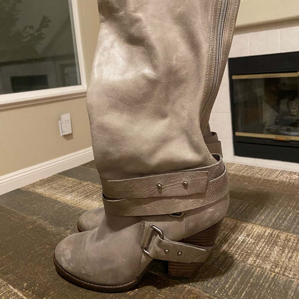 Fergilicious thigh high boots.